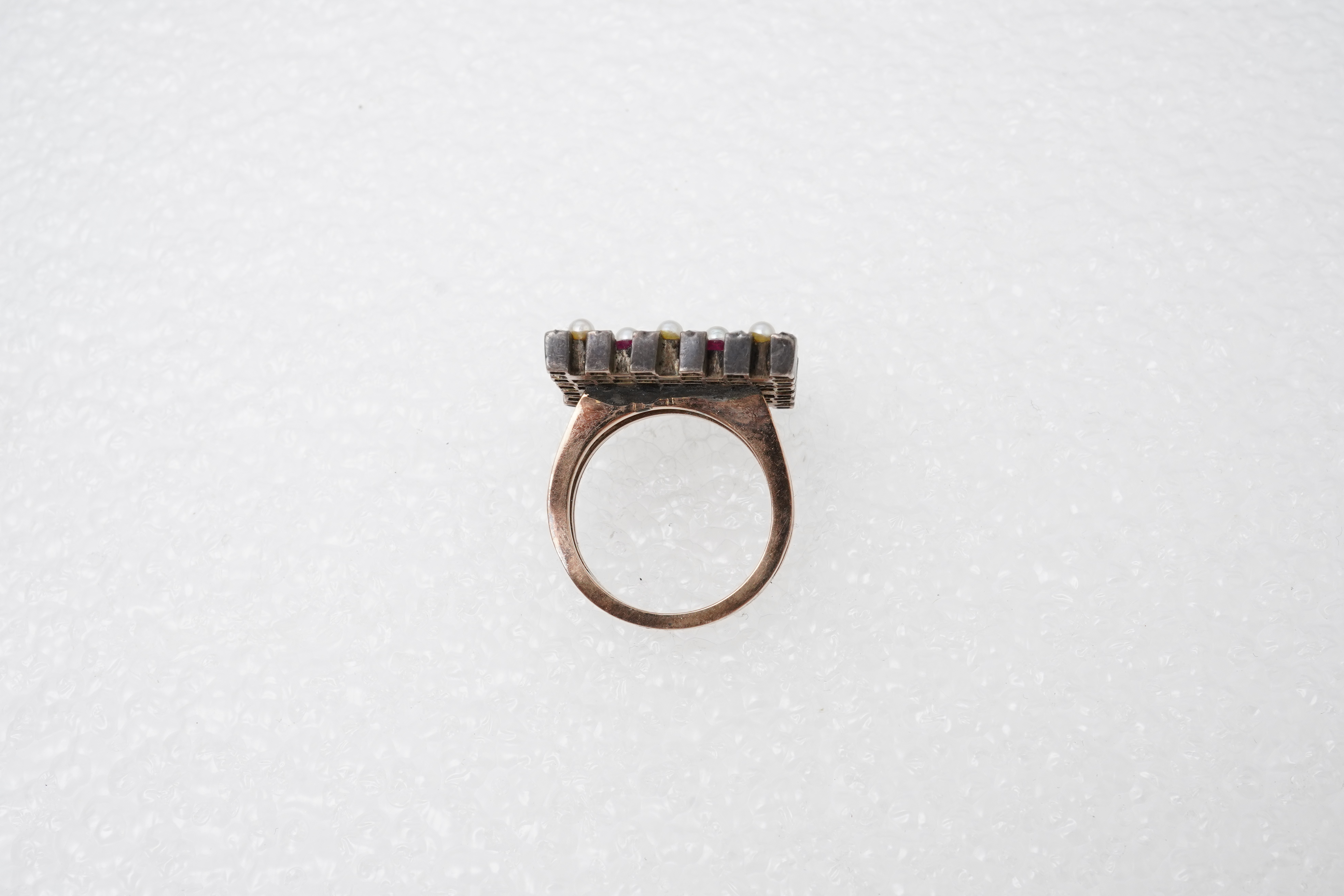 A synthetic ruby, seed pearl and diamond ring